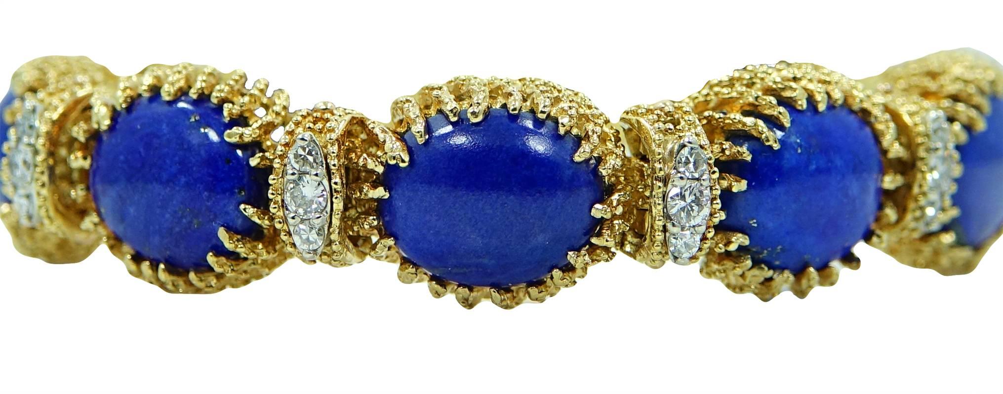 18K Yellow Gold La Triomphe Bracelet With 10 Oval Lapis Stones and 30 Round Brilliant Diamonds Weighing A Total Carat Weight Of 1.37ct. This Bracelet Is 6 Inches In Length.