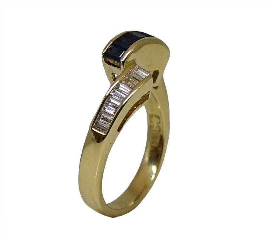 18K Yellow Gold Ring 5 Baguette Sapphires Weighing A Total Carat Weight Of 0.53ct and 17 Baguette Diamonds Weighing A Total Of 0.70ct I/J Color and VVS2/VS2 Clarity. This Ring Is A Size 6.5 And Can Be Sized.