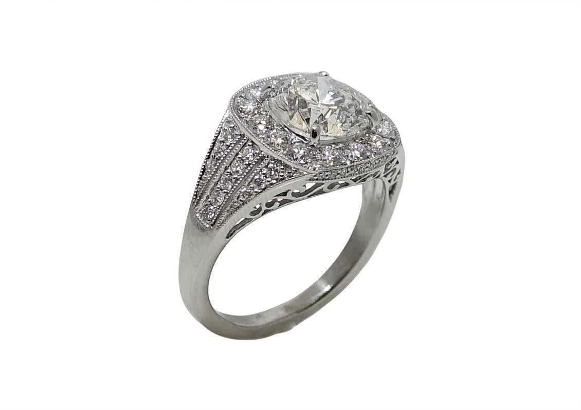 This Beautiful Platinum Engagement Ring Has A Center Diamond Weighing A Total Carat Weight Of 2.29 Carats, Diamonds Weighing A Total Carat Weight Of .75 Cover The Sides Of The Mounting. This This Is A Size 6 and Can Be Sized Upon Request. 