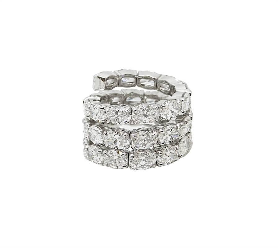 This Spiral Spring Ring Is 18K White Gold and Has 37 Beautiful Oval Diamonds Weighing a Total Carat Weight Of 18.80 Carats DEF Color and SI1 Clarity. this Ring Is A Size 6 But Can Fit Most Size Fingers Because Of its Unique Expanding Style.

All