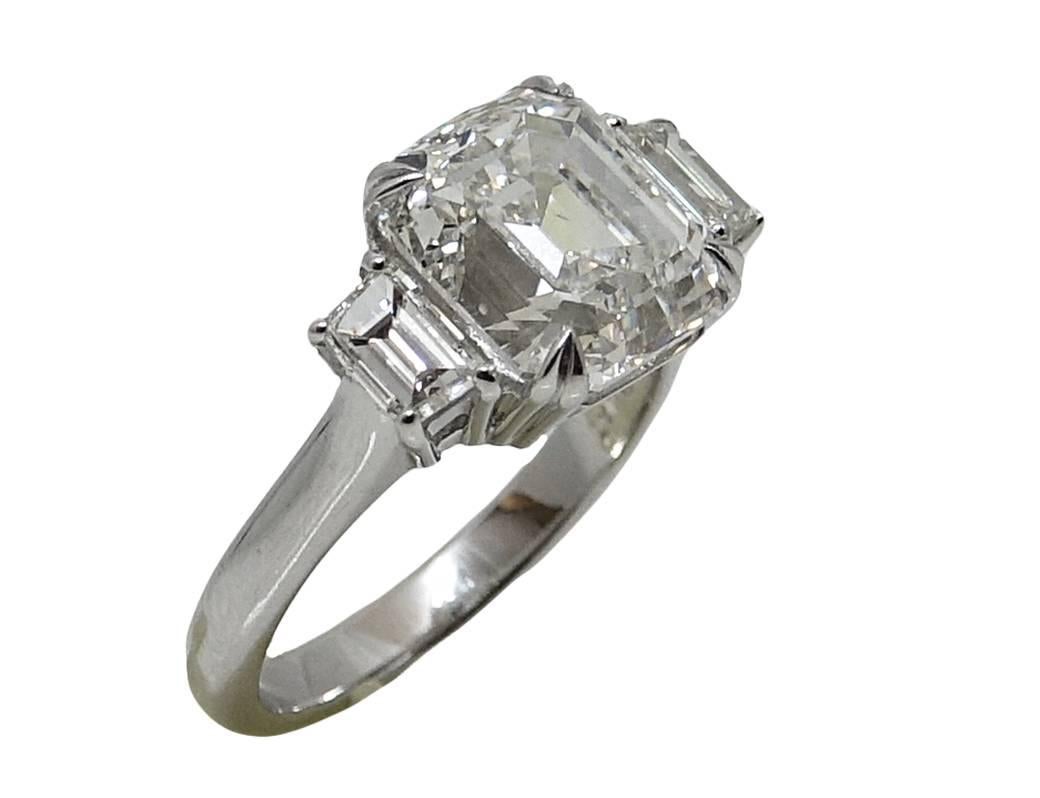 Women's 5.02 Carat Emerald Cut Diamond Platinum Engagement Ring For Sale