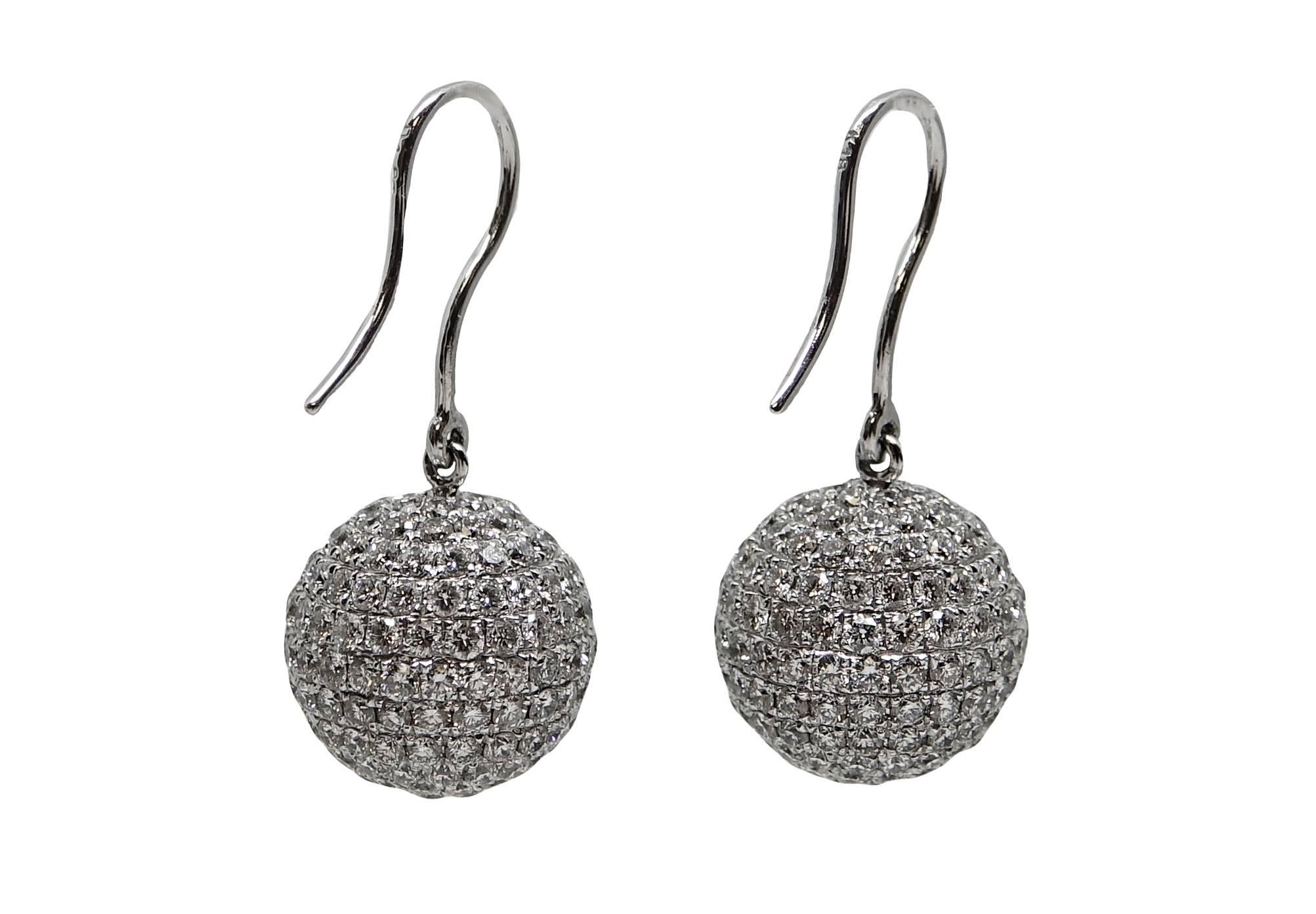 These 18K White Gold Earrings Have 370 Pave Diamonds Weighing A Total Carat Weight Of 5.00. 