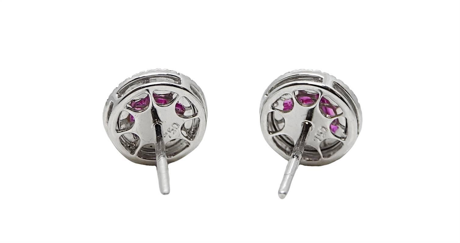 18K White Gold Earrings With 18 French Cut Pink Sapphires Weighing A Total Carat Weight Of 1.80 Carats, and 40 Round Diamonds Weighing A Total Carat Weight of 0.18 Carats, G-H Color, VS-SI1 Clarity. 