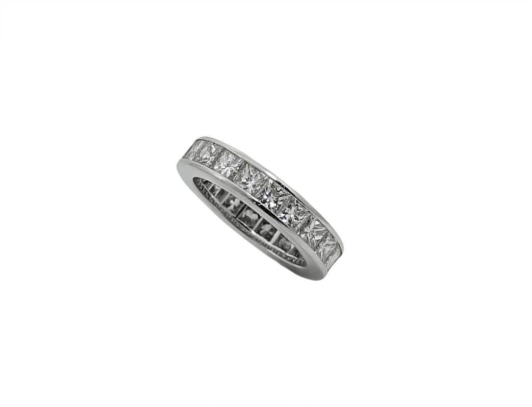 This Kwiat Platinum Eternity Band Has Approximately 20 Princess Cut Diamonds Weighing A Total Carat Weight Of 4.00 Carats, G-H Color and VS in Clarity. This Band Ring Is A Size 6.5.