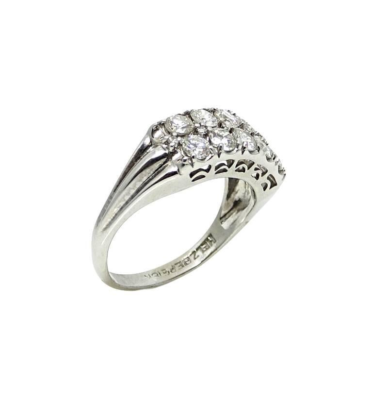 This 18K White Gold Ring Contains 10 Diamonds Weighing A Total Carat Weight Of 1.00 Carats. This Ring Is A Size 6 and Can Be Sized Upon Request.