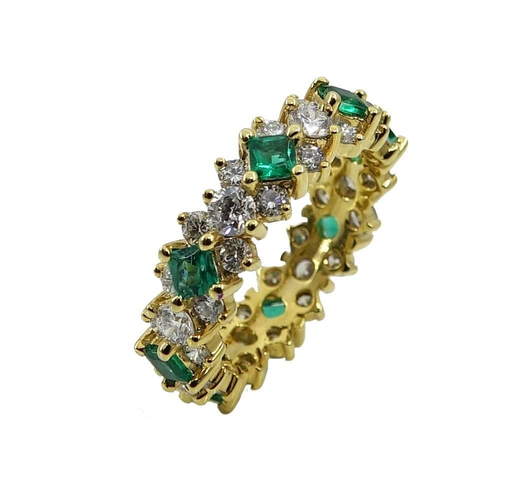 This Vibrant Eternity Band Has Round Diamonds Weighing A Total Carat Weight Of 2.32 Carats. The Emeralds In This Ring Weight A Total Carat Weight Of 1.20 Carats. This Ring Is A Size 6.5.