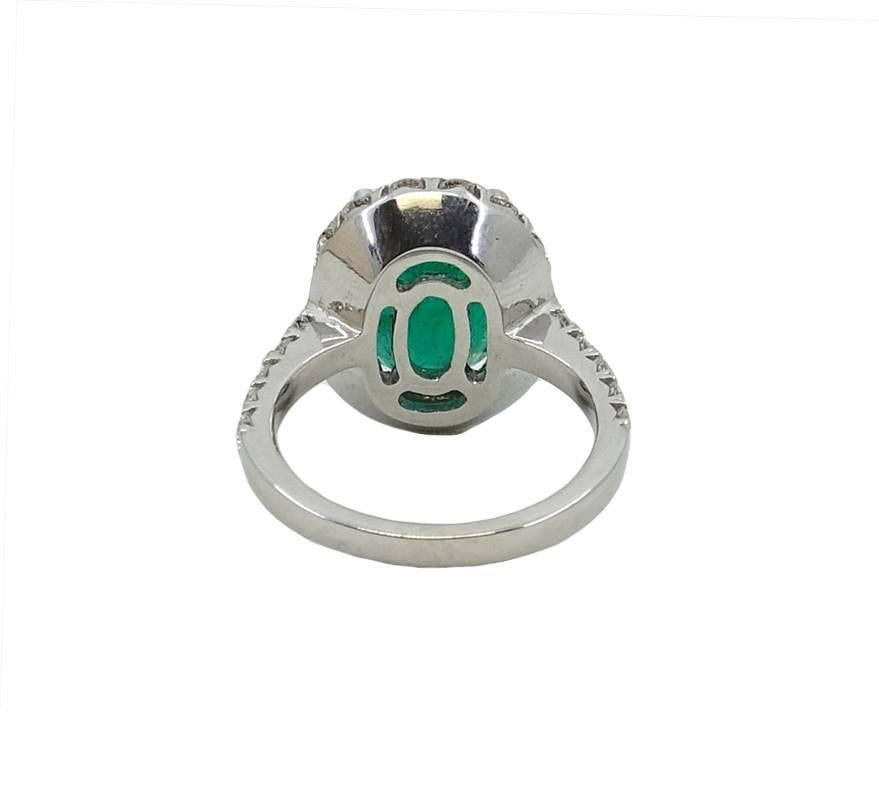 5.20 Carat Oval Cut Emerald and Diamond White Gold Engagement Ring In New Condition For Sale In Naples, FL