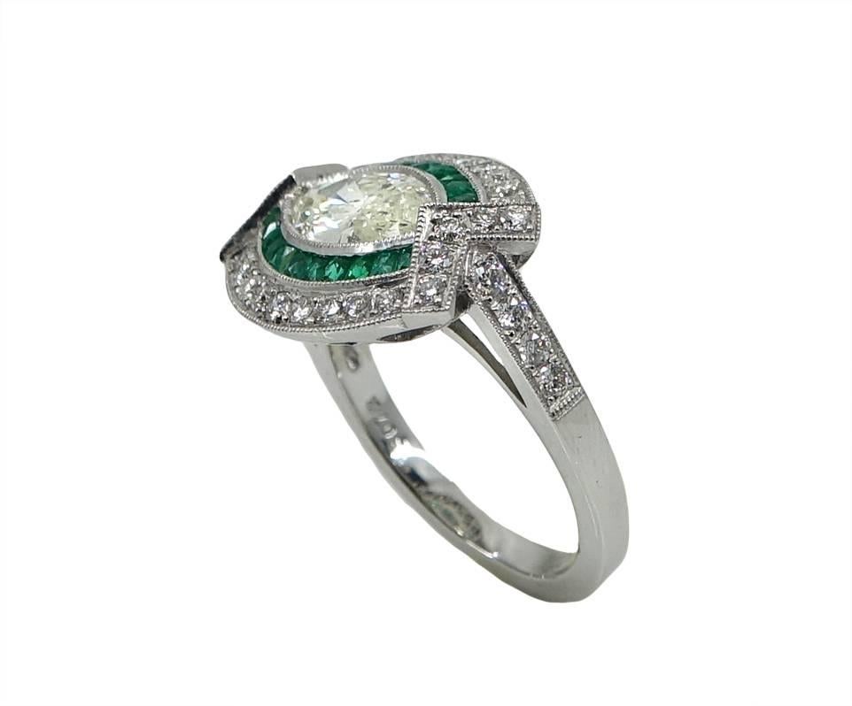 Marquise Cut Marquise Diamond and Emerald Platinum Ring
