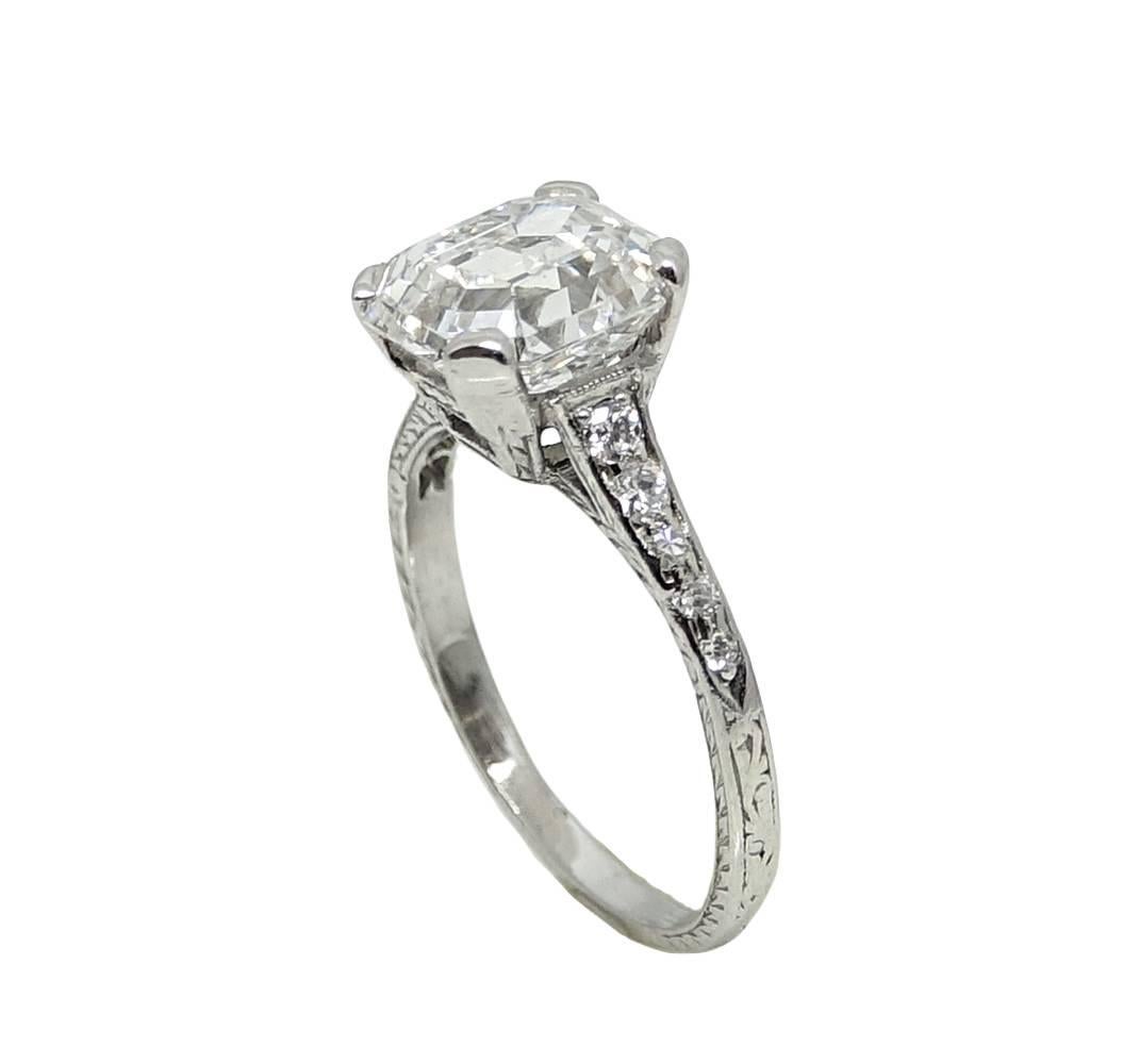 This Lovely Platinum Engagement Ring Has A Cut Cornered Rectangular Step Cut Diamond Weighing A Total Carat Weight Of 2.46 Carats, E Color and VVS2 Clarity. (GIA CERT: 5182297170) This Engagement Ring Is A Size 6.5 And Can Be Sized Upon Your