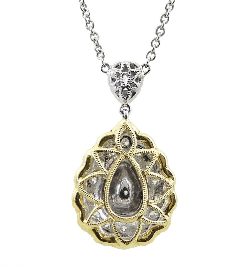 This Sparkling 18K White Gold Pendant Necklace Has A Gorgeous Pear Shaped Fancy Yellow Diamond In The Center Weighing A Total Carat Weight Of .80 Carats. Yellow and White Diamonds Cover The Pendant And Weigh A Total Carat Weight Of 2.21 Carats, VS2
