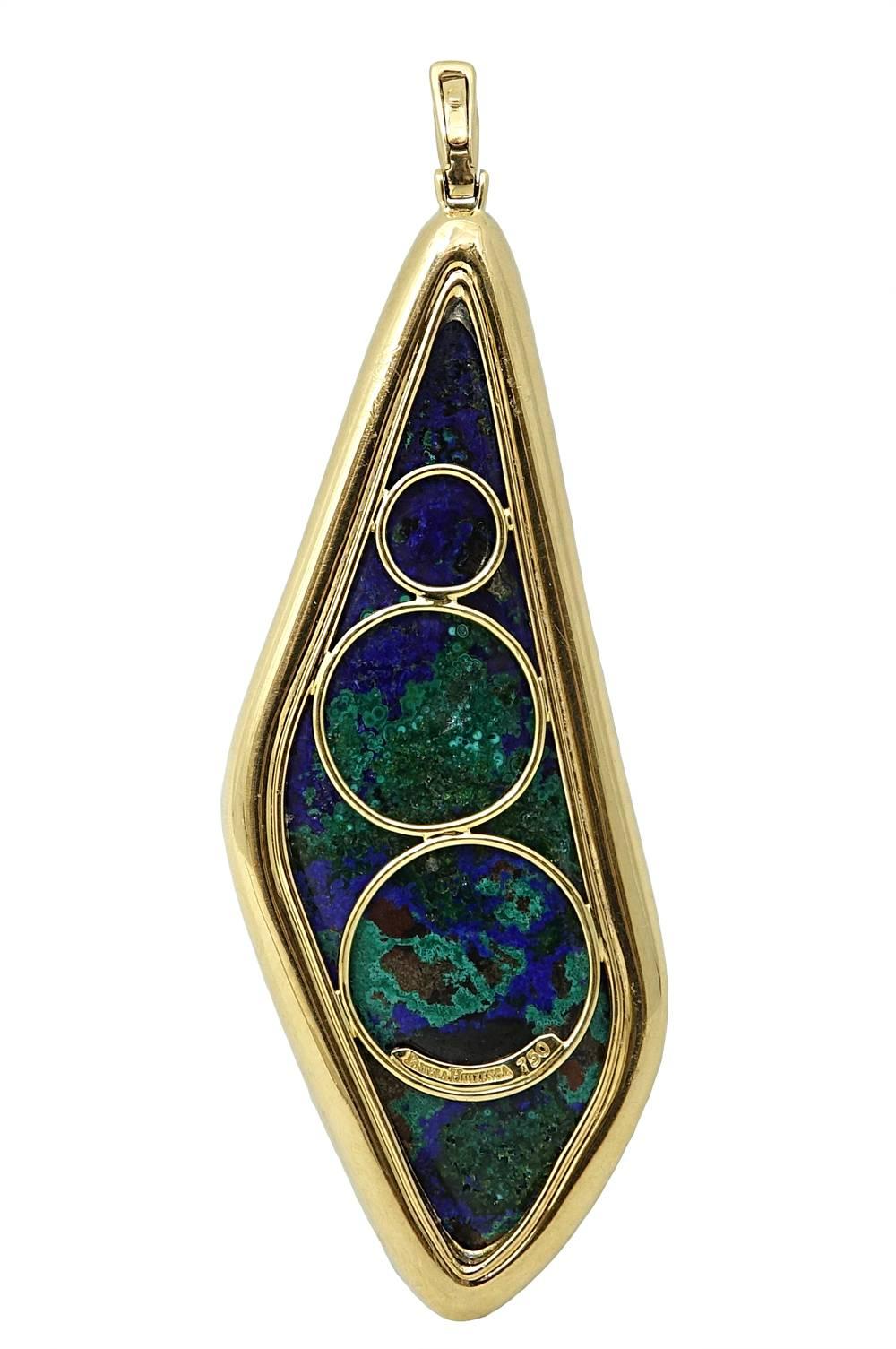 This 18K Yellow Gold Pamela Huizenga Pendant Is Absolutely Gorgeous, A Beautiful Azurite Malachite Is Set In The Center and Weighs A Total Carat Weight Of 132.63 Carats. Diamonds Surround This Stunning Stone and Weigh A Total Carat Weight Of 1.52