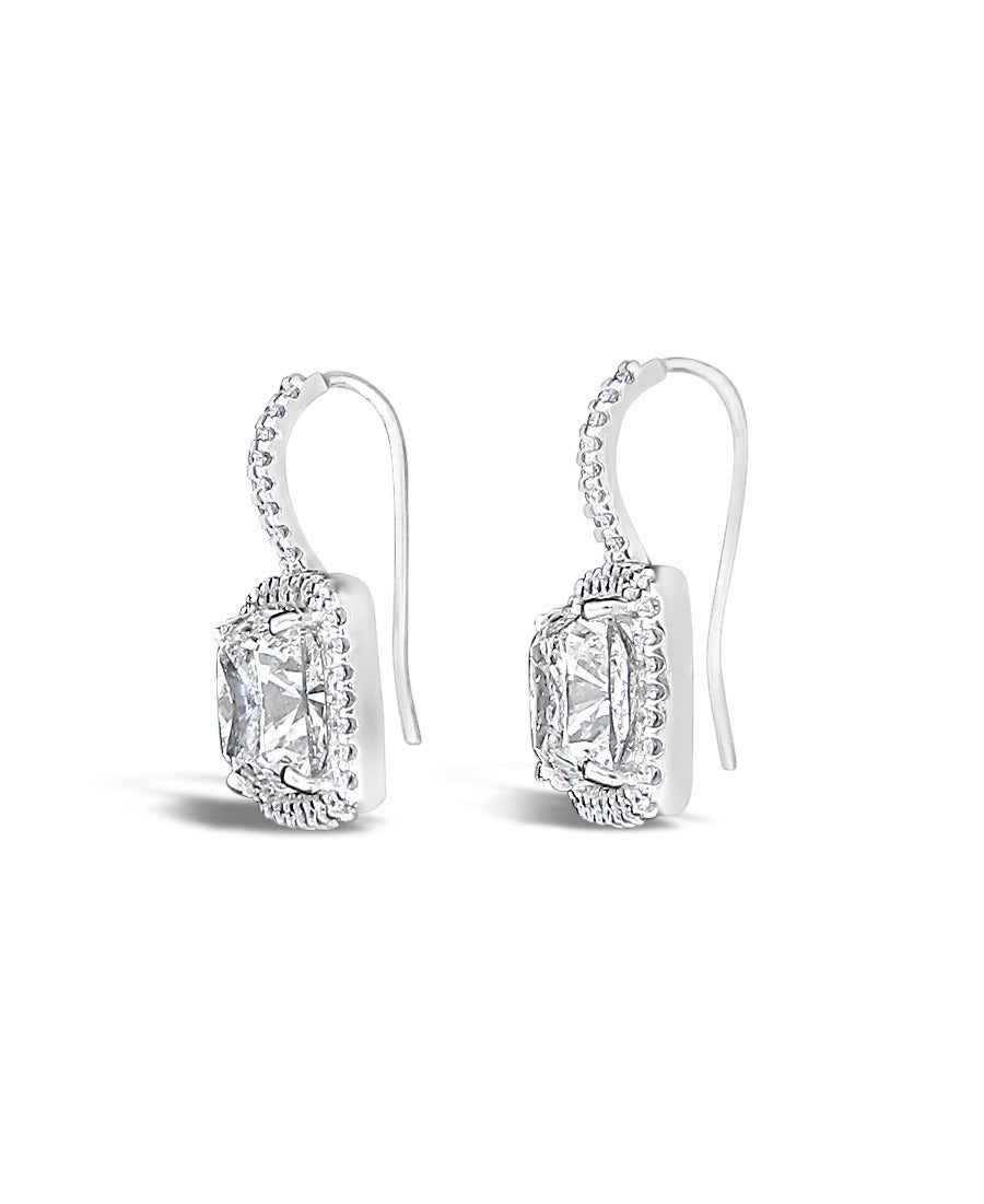 These earrings are absolutely beautiful and would match perfectly with the diamond pendant that is also posted on 1stdibs in our store.

Below are the GIA Reports for both Center Diamonds.
1) Diamond Grading Report 
GIA 1162194959
Cushion