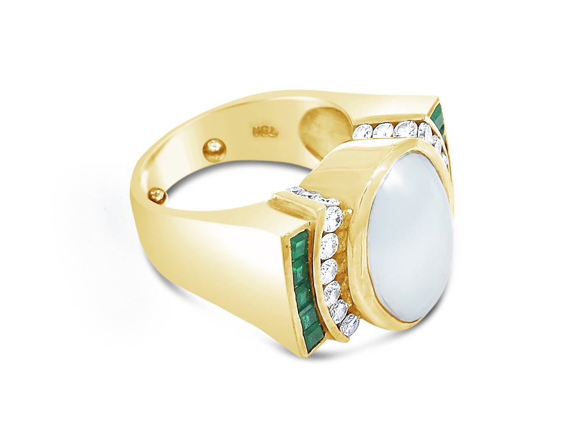 Up for sale is this beautifully designed ring by Charles Krypell. Center White Pearl is approximately 15.80mm x 11.45mm and is in excellent condition. Emeralds are single cut and approximately 2mm x 2mm each. There are 12 round brilliant diamonds