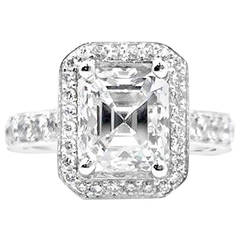 2.47 Carat GIA Cert Emerald Cut Diamond in Diamond Gold Halo Ring
