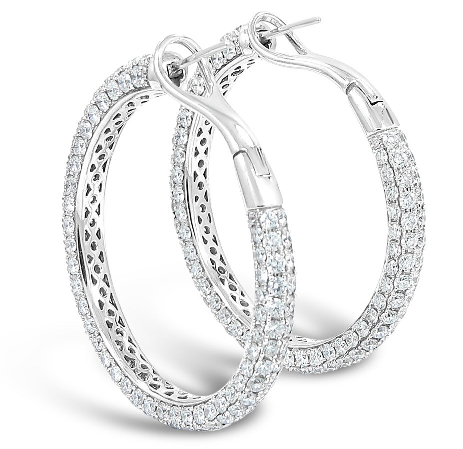 We are pleased to offer these Estate Roberto Coin Pave Diamond Hoop Earrings. Total Diamond weight is 9.66cts. Each Round brilliant diamond is near colorless, VS quality and prong set in 18k white gold. Omega backings are in perfect working