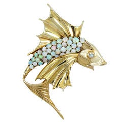 "Reflection" Fish Brooch with Opals on Yellow gold