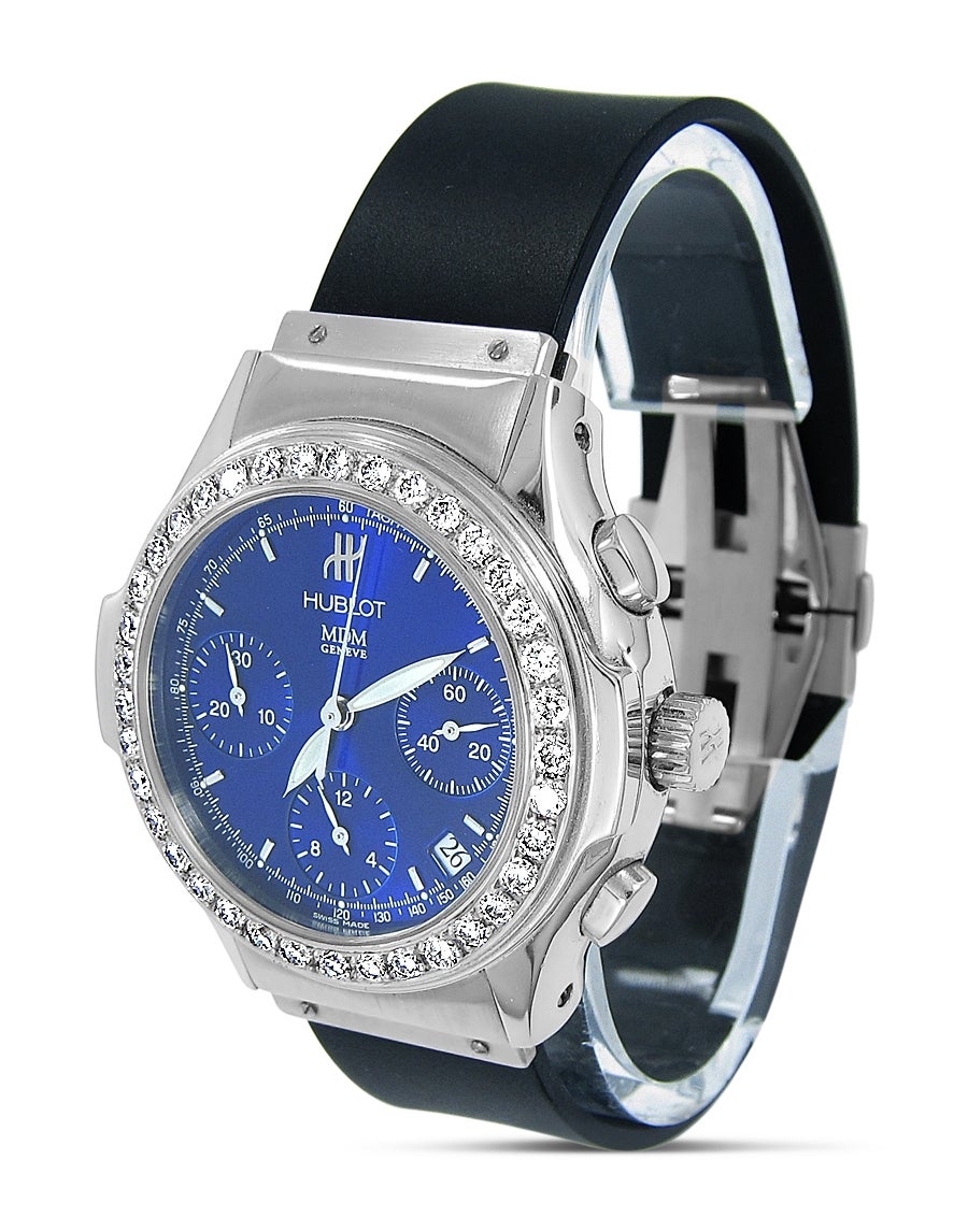Up for sale is this HUBLOT MDM Geneve Watch with Blue Dial and Diamond Bezel. 
Brand: HUBLOT 
Model Number: 448654 
Serial Number: 1810.1 
Case Diameter: 40mm 
Dial: Blue Dial, Silver Luminous Hour Markers, Silver Luminous Dagger Shaped hands
