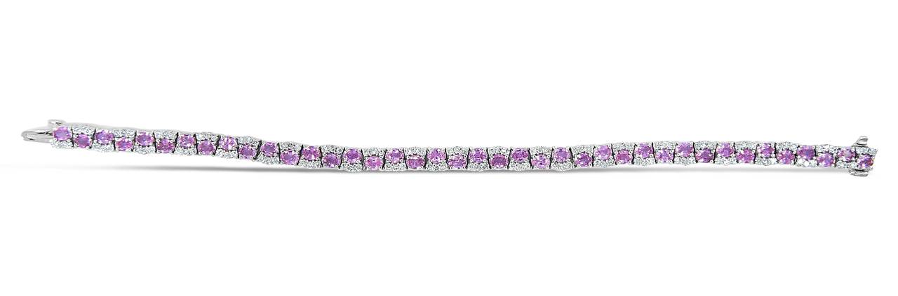 Pink Sapphire Diamond Gold Tennis Bracelet In Excellent Condition For Sale In Naples, FL