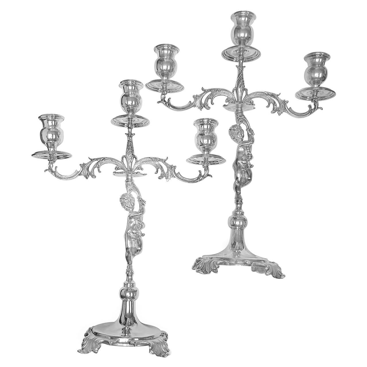 Set of Two Silver Candelabra with Baby Holding Triple Candle Top