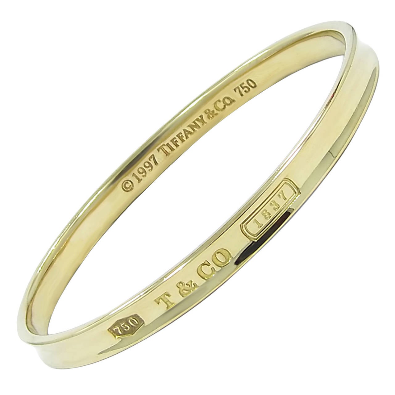 Tiffany & Co. Gold "1837" Bangle Bracelet