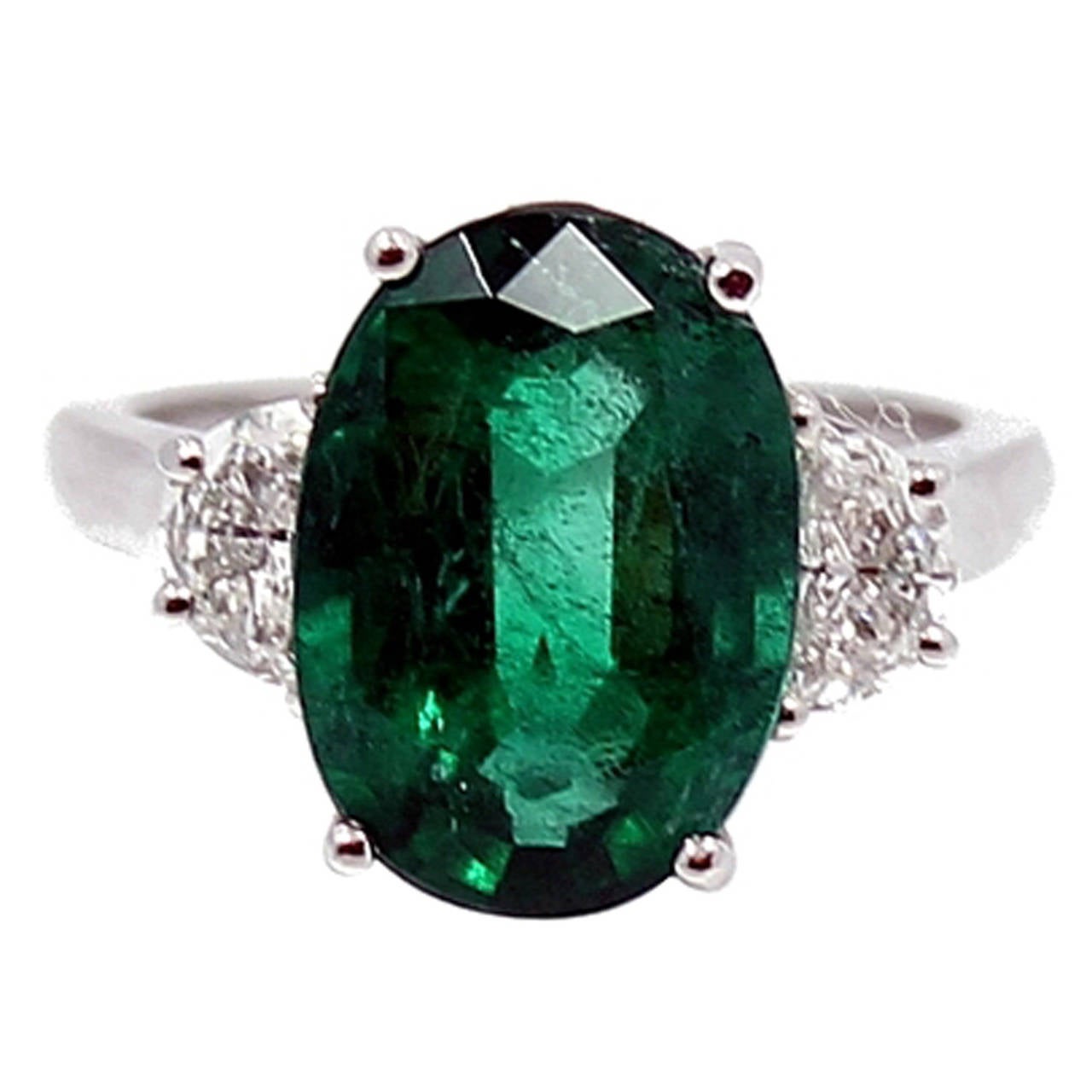5.86 Carat Oval Emerald Engagement Ring For Sale