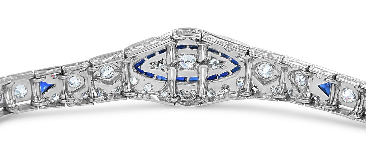 This vintage bracelet holds approximately 3.25cts in round diamonds with mix cuts of old euro cut diamonds, old mine cut diamonds and single cut diamonds. All have great quality and great sparkle. Sapphires are delicately bezel and half bezel set to