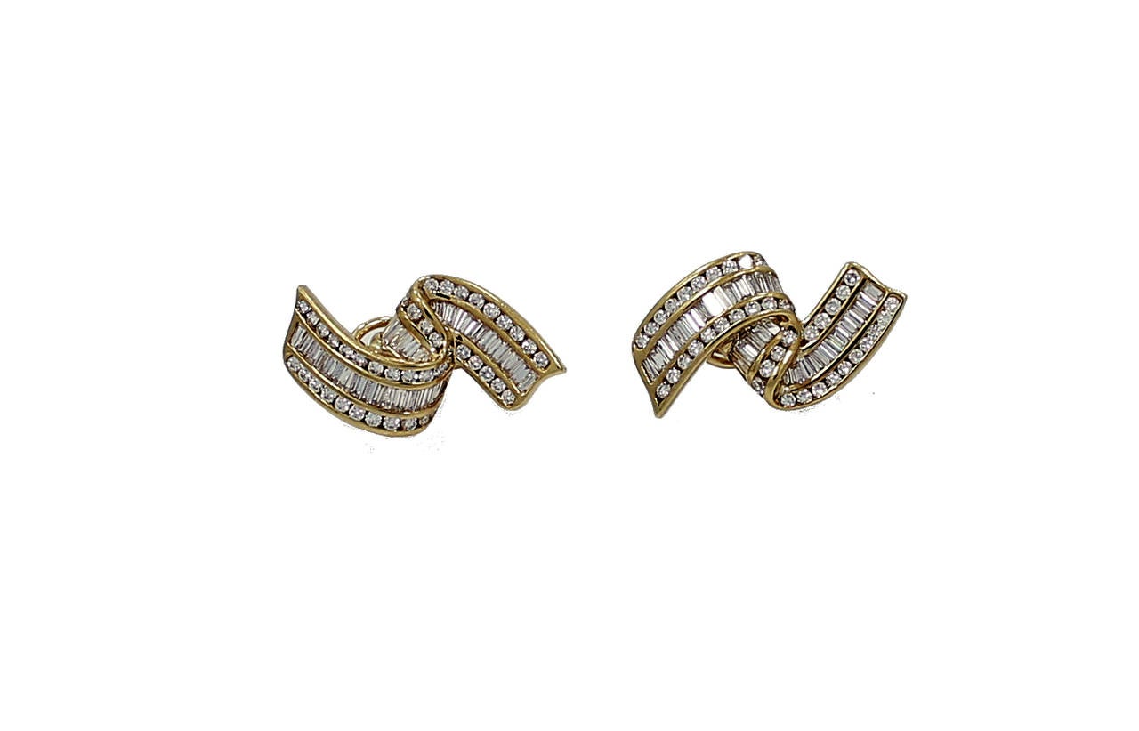 Luxury Charles Krypell  yellow gold Earrings with round brilliant diamonds and baguettes. These timeless earrings feature approximately 5.00 carats in diamond weight, G-H color and VS Clarity. The craftsmanship and quality are synonyms with the