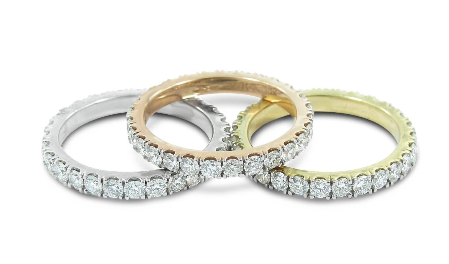 These 3 stackable eternity bands have a total of 3.08cts of round brilliant cut diamonds. They are constructed of 14k White, Yellow and Rose Gold. Rings are all at a size 5.50.
