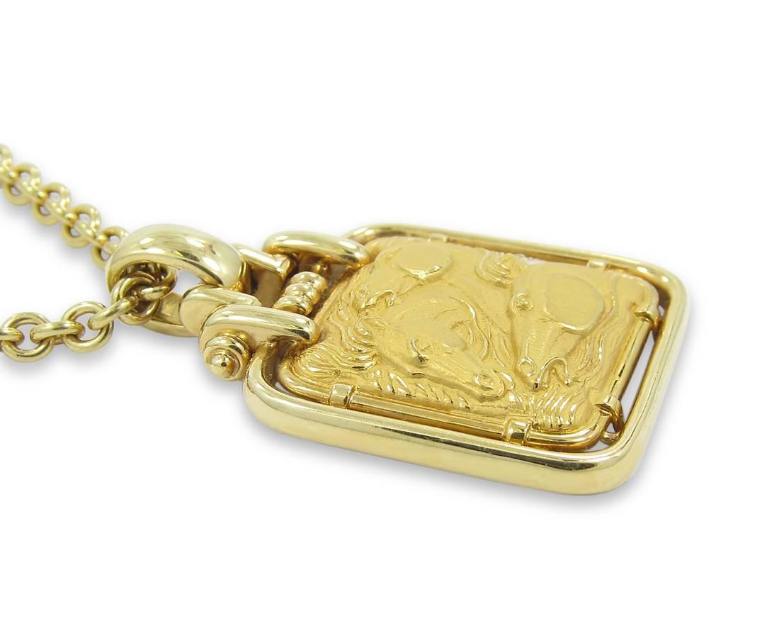 This estate 18k yellow gold Carrera Y Carrera pendant has a beautiful picture of three horses. The pendant measures .88 inches wide by 1.25 inches with bail from top to bottom. The 18k yellow gold Carrera Y Carrera chain measures 18.25 inches.