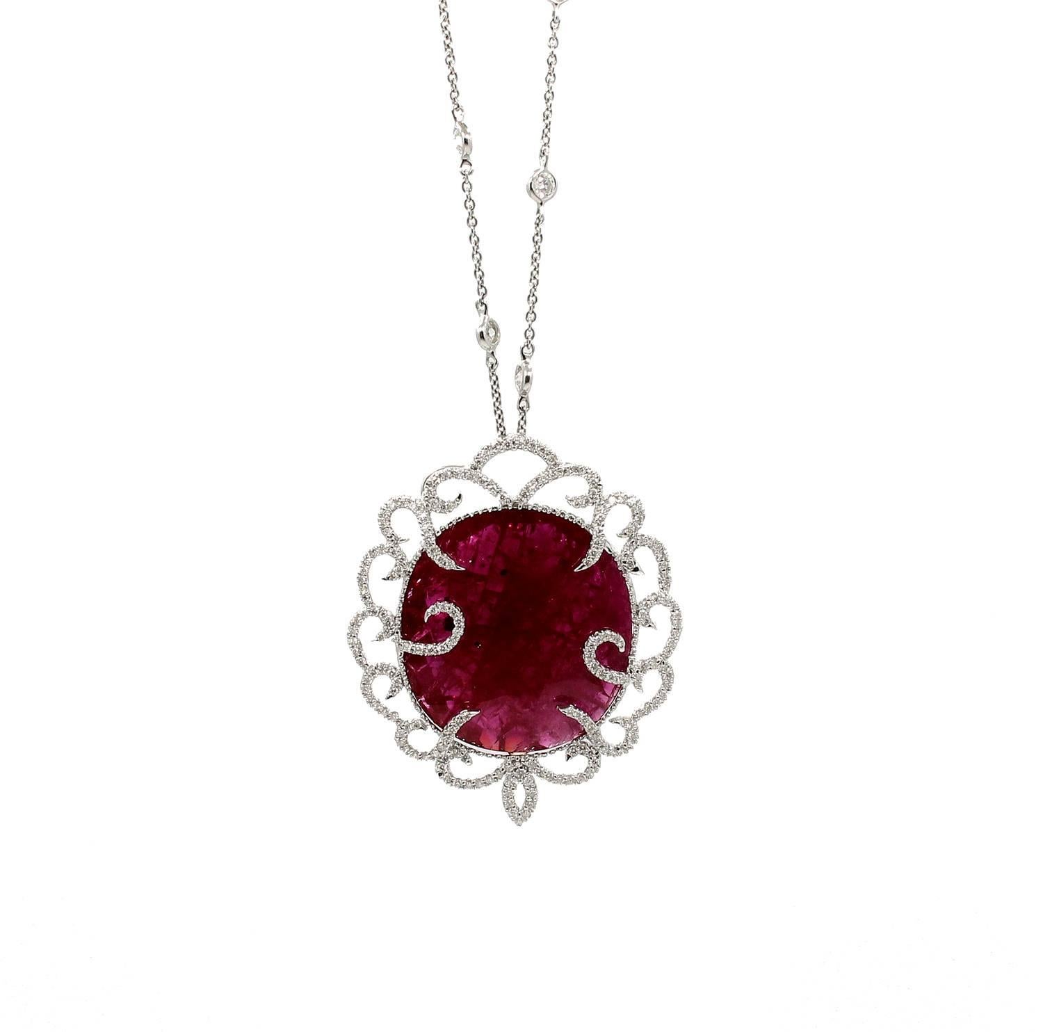 18K White Gold Diamond Station Necklace with Ruby Slice and Diamond Pendant. This unique Pendant has a center ruby slice which equals 53.96 carats and is surrounded by round brilliant diamonds. The necklace is a 20 inches Diamond Station Necklace