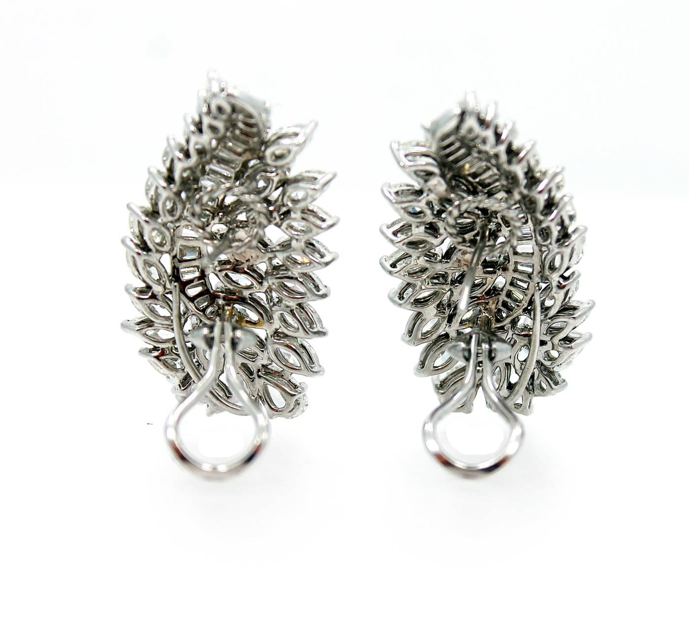 Platinum Earrings with 90 Diamonds with a total of 11.75 carats, H-J Color and VS1-SI1 in clarity. Excellent condition.