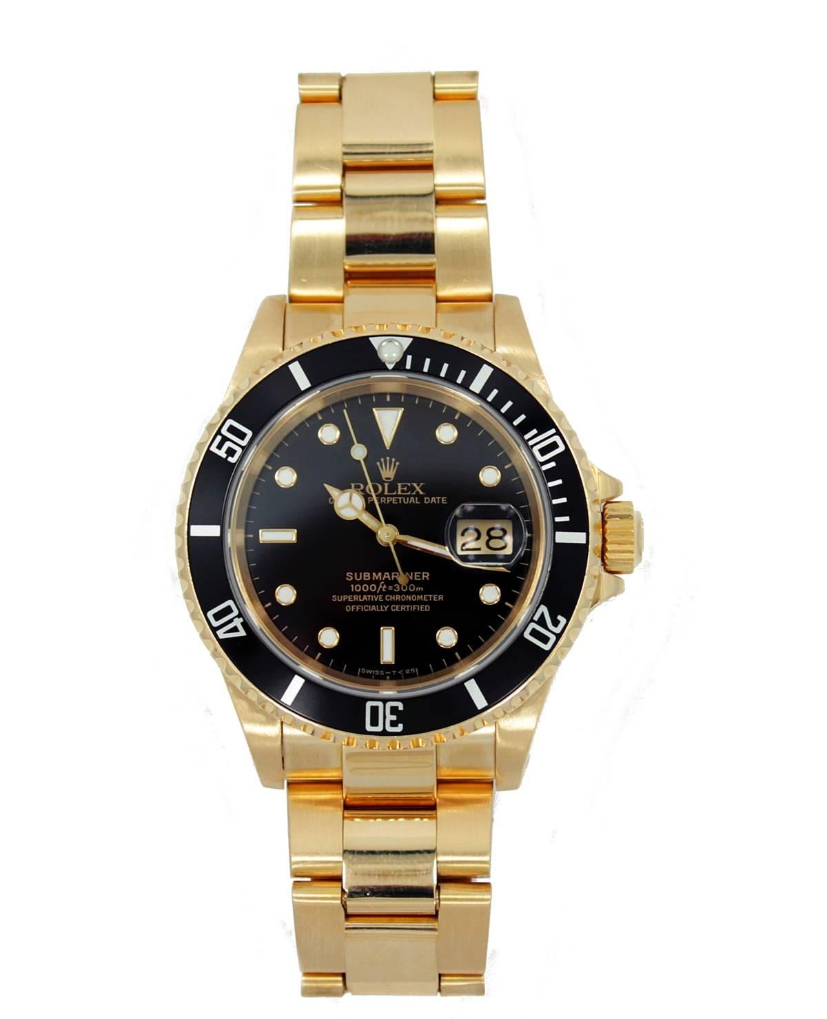 Rolex Submariner 40mm 18K Yellow Gold with Oyster Bracelet, Black Dial and Black Bezel. This watch has been fully serviced and refurbished, in excellent working condition. It is model 16618 and circa 1991.Serial X634XXX. Watch is sold with a one