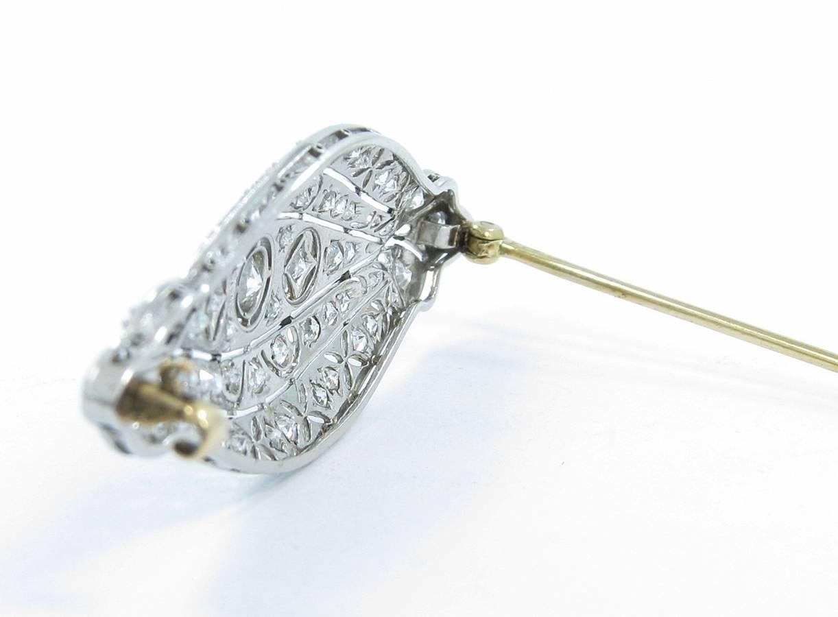 Art Deco Platinum Pin with approximately 3cts total weight of old cut round diamonds. All diamonds are near colorless and SI - VS in clarity. Largest diamond in center is approximately .50cts. This pin was put together with such great craftsmanship.