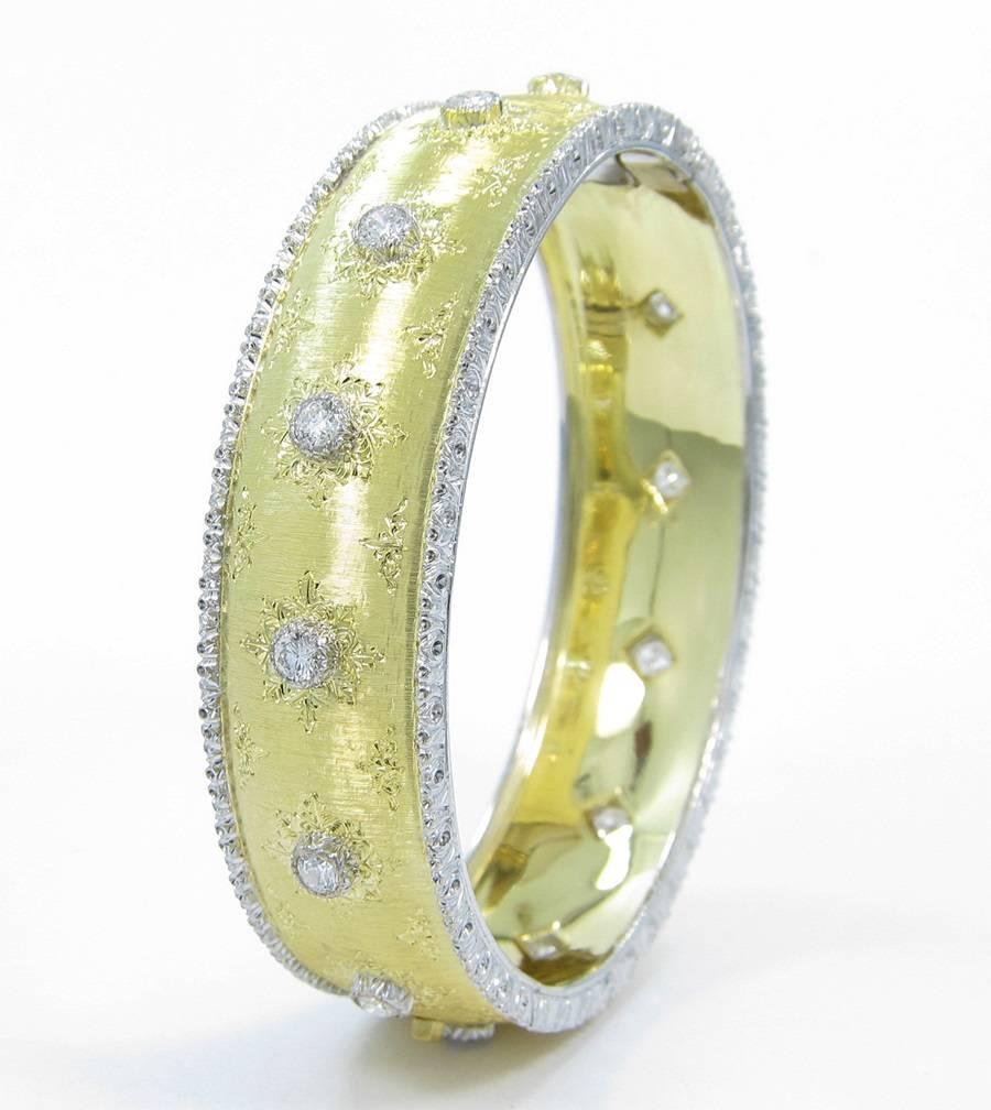 Buccellati 18k white and yellow gold bangle bracelet with 1.80cts of excellent quality round brilliant cut diamonds. This bracelet is stamped 
