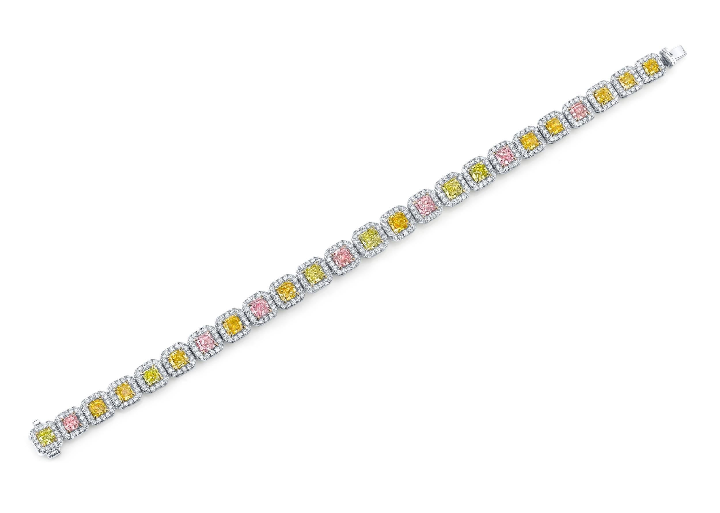 Platinum Bracelet with 24 Mixed Fancy Color Radiant Cut Diamonds weighing 9.34ct and 384 Round Brilliant Cut Diamonds weighing 3.39ct. The bracelet is 7 inches long and absolutely beautiful. 