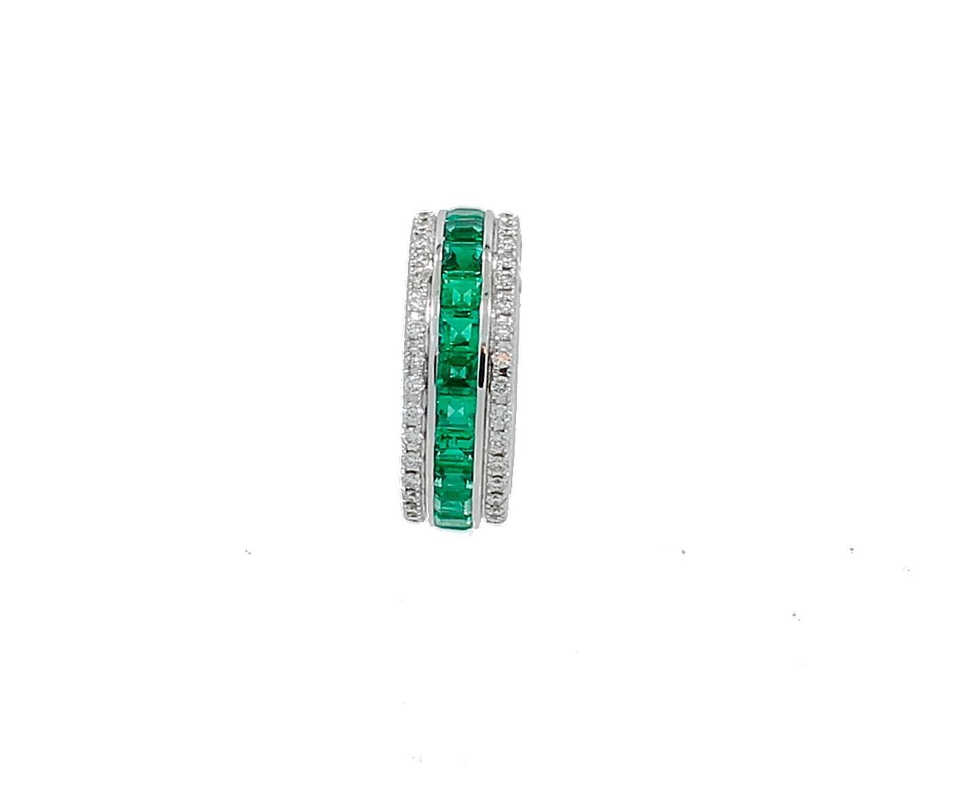 18K White Gold Band with 24 French Cut Emeralds weighing a total of 3.09ct and 72 Round Brilliant Cut Diamonds weighing a total of .66ct G-H in color and VS2-SI1 in clarity. The band is a size 6 1/2. Beautifully made band.