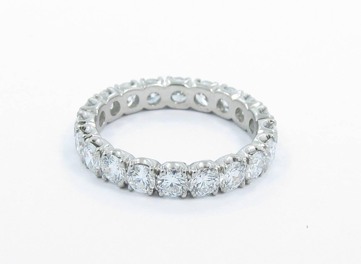 Platinum diamond eternity band hold 20 round brilliant cut diamonds. Quality of G-H, VS. All diamonds are securely prong set. Ring sits at a size 8. 