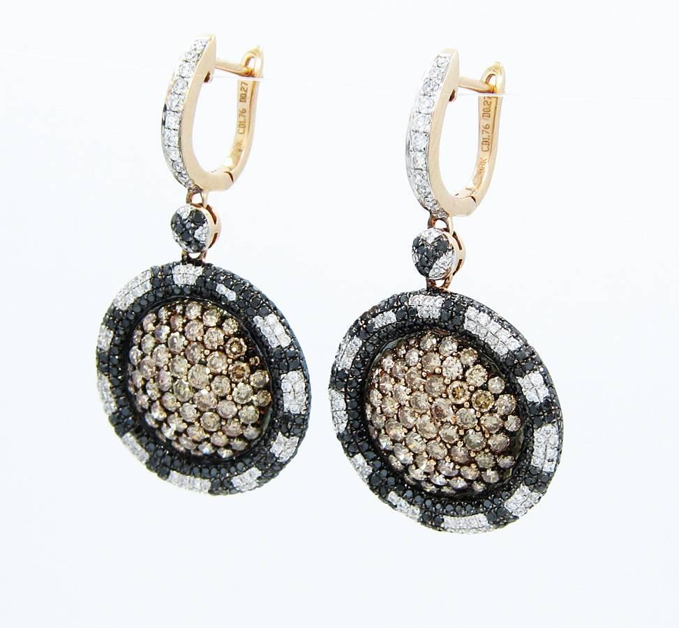 LeVian earrings that are sure to dazzle those that wear. These impressive earrings have a total weight of 3.52cts of chocolate diamonds and .54cts total weight of mixed black and white diamonds set in 18k Rose Gold. The carat weights are stamped