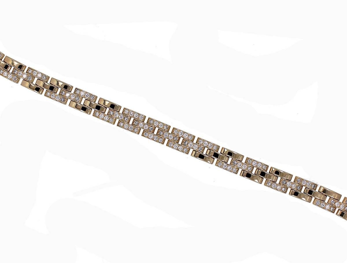 Cartier 18K Yellow Gold Maillon Panthere Bracelet. This iconic bracelet is the three rows of interlocking links with 120 Round Brilliant Cut Diamonds which equal a total of 3.00 carats and are F color and VVS Clarity.  The bracelet comes with the