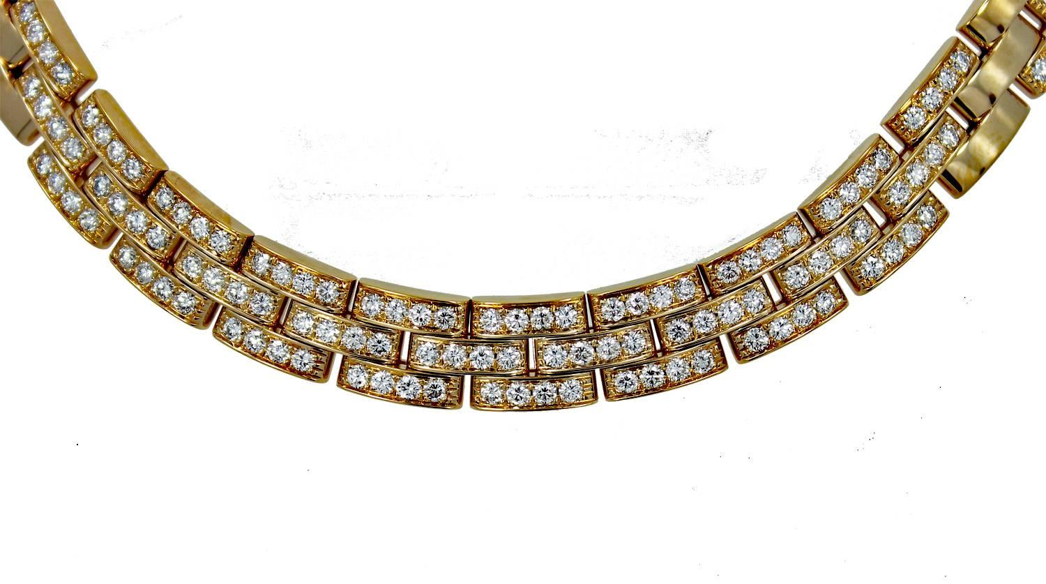 Cartier 18K Yellow Gold Maillon Panthere Neckclace. This iconic necklace is the 3 rows of interlocking links with 228 Round Brilliant Cut Diamonds which equal  approximately of 6.00 carats and are F color and VVS Clarity.  The Necklace comes with