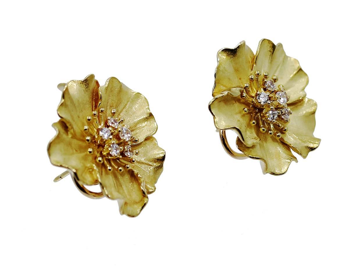 Tiffany & Co. 18K Yellow Gold Alpine Rose Earrings with 12 round Brilliant  Diamonds in prong settings. The diamonds weigh approximately .75ct in total and are G-H in Color and VS in clarity.  The backs of the earrings are moega-style clips with