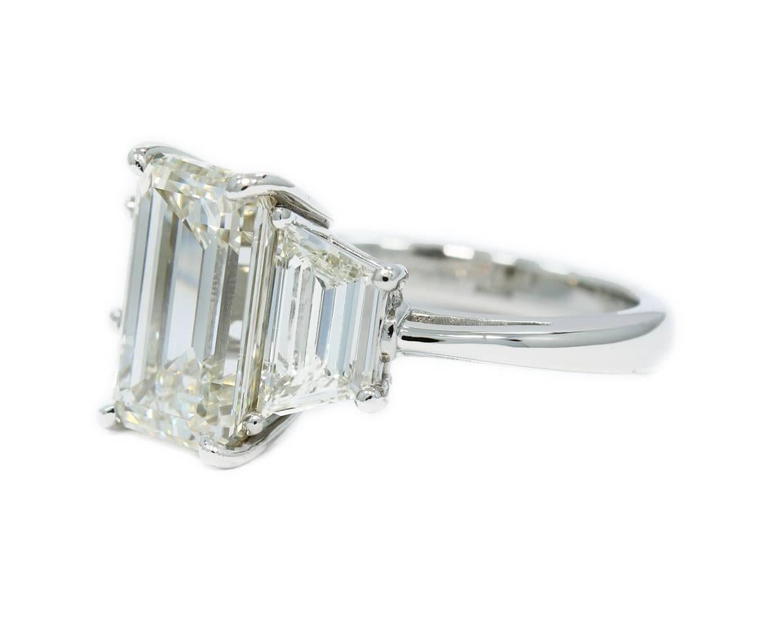 Emerald Cut 3.06 Carat Diamond Three-Stone Engagement Ring with Bez Ambar Platinum Mounting For Sale