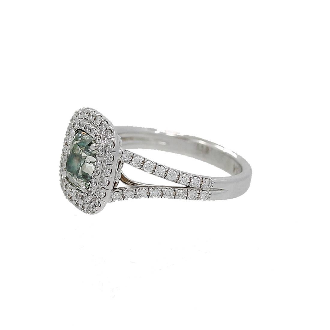 18K White Gold Engagement Ring with a Natural Fancy Cushion Cut Diamond. This rare stone is Grayish, Yellowish, Green and weighs 2.05 carats. It is I1 in clarity and has a GIA report #115730070. A beautiful and rare find. The ring is a size 6.5 but