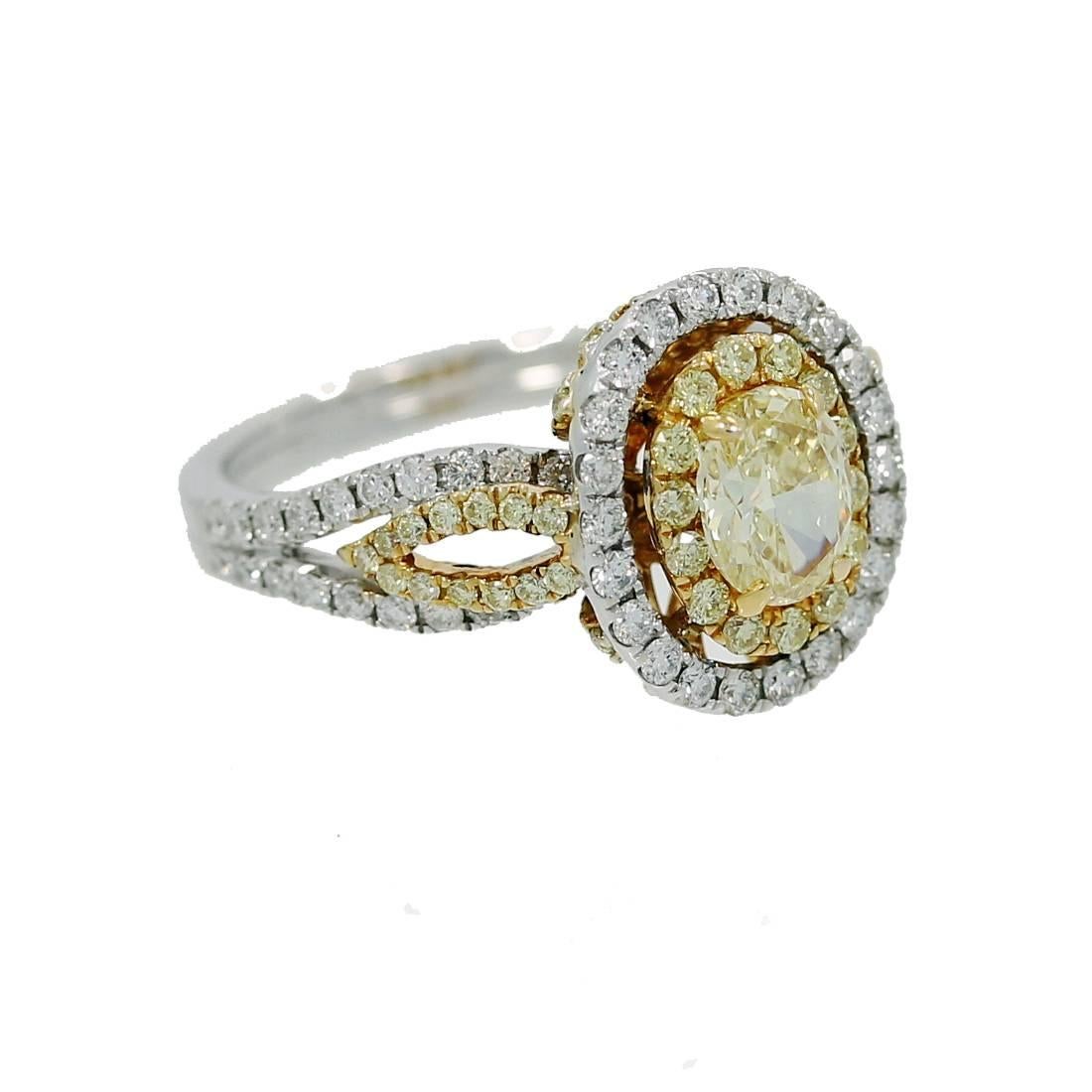 Oval Fancy Intense Yellow Diamond Two Color Gold Ring In New Condition For Sale In Naples, FL