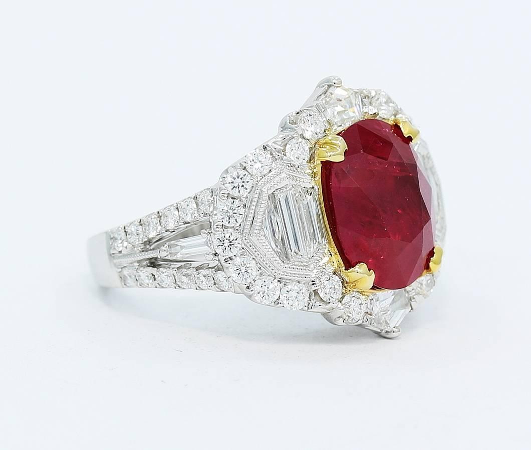 5.50 Carat Oval Ruby with Baguette and Round Brilliant Cut Diamonds Gold Ring In New Condition For Sale In Naples, FL