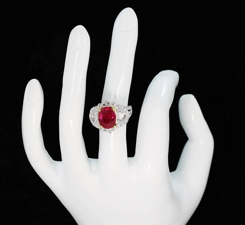 5.50 Carat Oval Ruby with Baguette and Round Brilliant Cut Diamonds Gold Ring For Sale 1