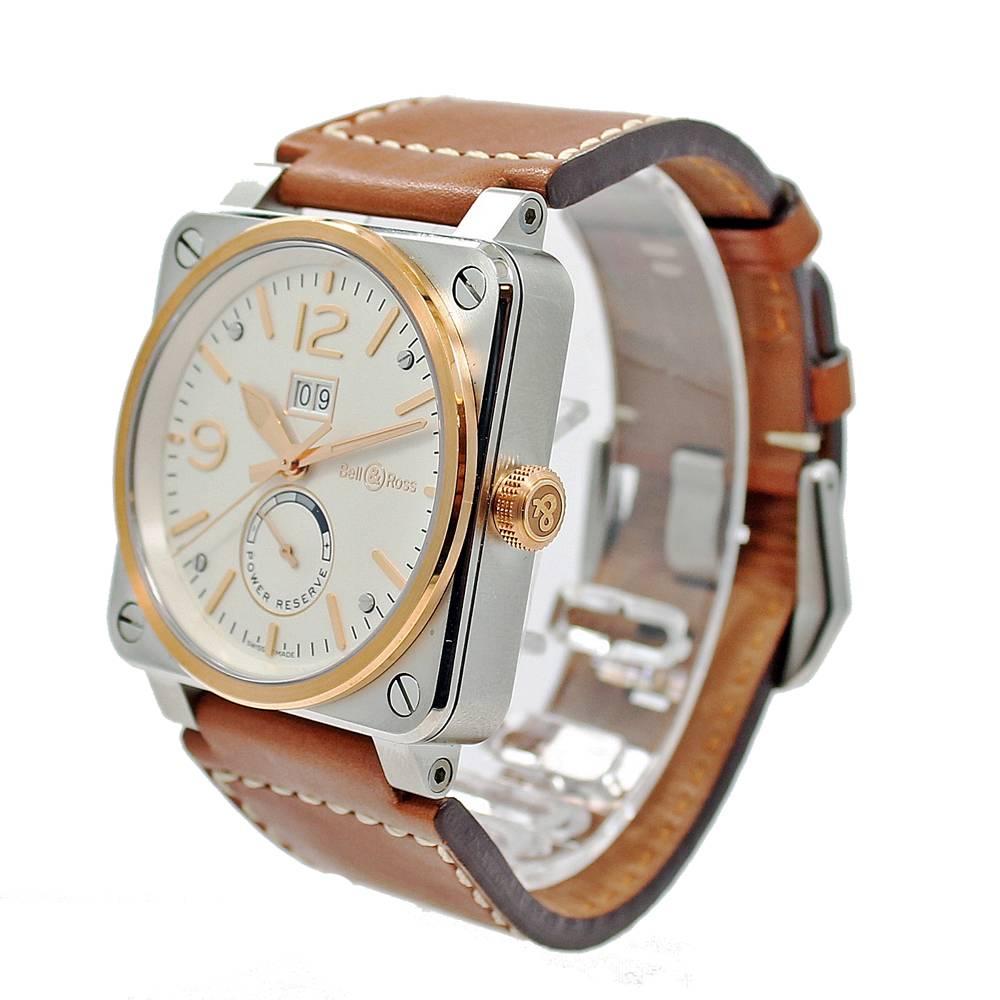 Bell & Ross BR03-90 Steel & Rose Gold Wristwatch Model BR0390-BICOLOR. This watch is 42mm in diameter and is cased in Stainless Steel case with an 18K Rose Gold Bezel. It features a mechanical automatic movement with the following functions: hours,