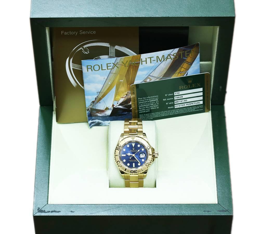 Rolex Yachtmaster
Serial Number: M816xxx
Reference Number: 16628
Case: 18k yellow gold
Movement: Automatic Movement 
Case: 40mm
Crystal: Sapphire 
Dial:  Blue Dial with luminescent markers and hands.
Bracelet: 18k yellow gold solid links.