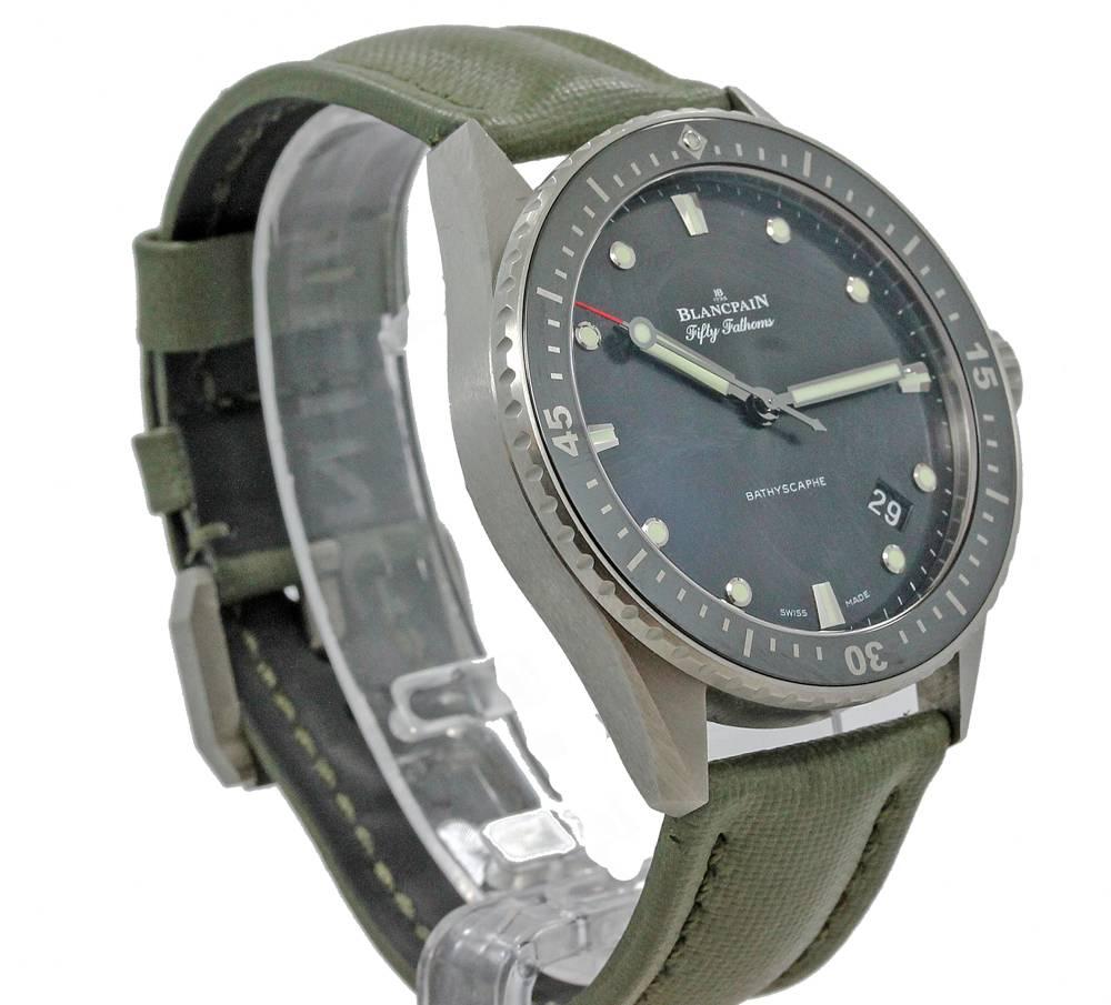 Blancpain Fifty Fathoms Bathyscaphe Titanium Automatic Movement with Sapphire Transparent Back, Grey Dial, Uni Directional Bezel, and Luminous Hands and Hour Markers. This is No.302, in excellent condition. All original with Box, Books and Papers. 