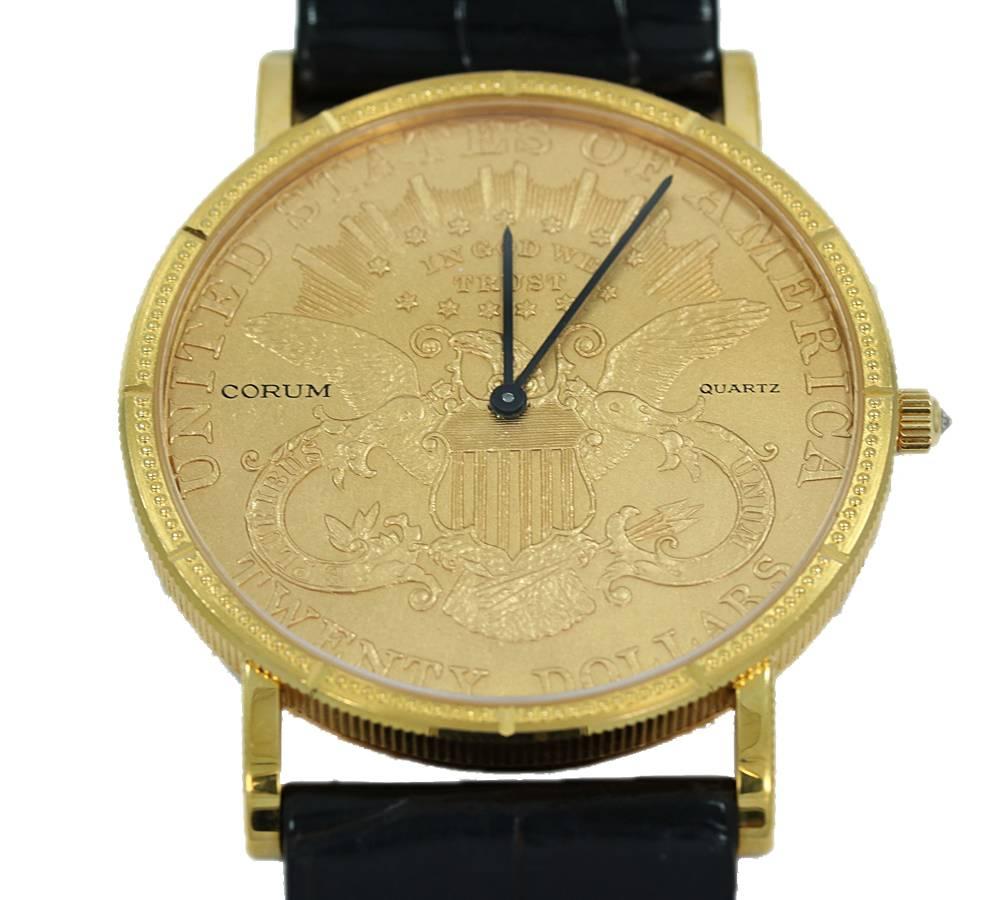 CORUM $20 COIN WATCH 1893 QUARTZ
Reference #: TWENTY DOLLAR GOLD COIN
Case: 18K YELLOW GOLD
Movement: QUARTZ
Case: 35MM 
Crystal: SAPPHIRE CRYSTAL
Dial:  UNITED STATES OF AMERICA TWENTY DOLLARS COIN EAGLE WITH BLUED STEEL HANDS
Crown: ORIGINAL CORUM